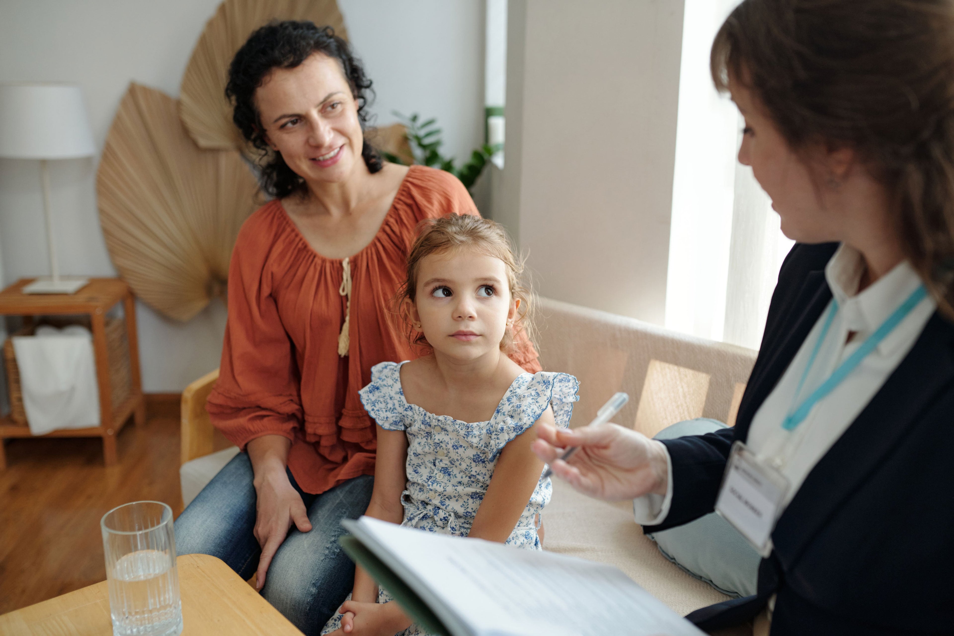 Parents meeting with a health professional