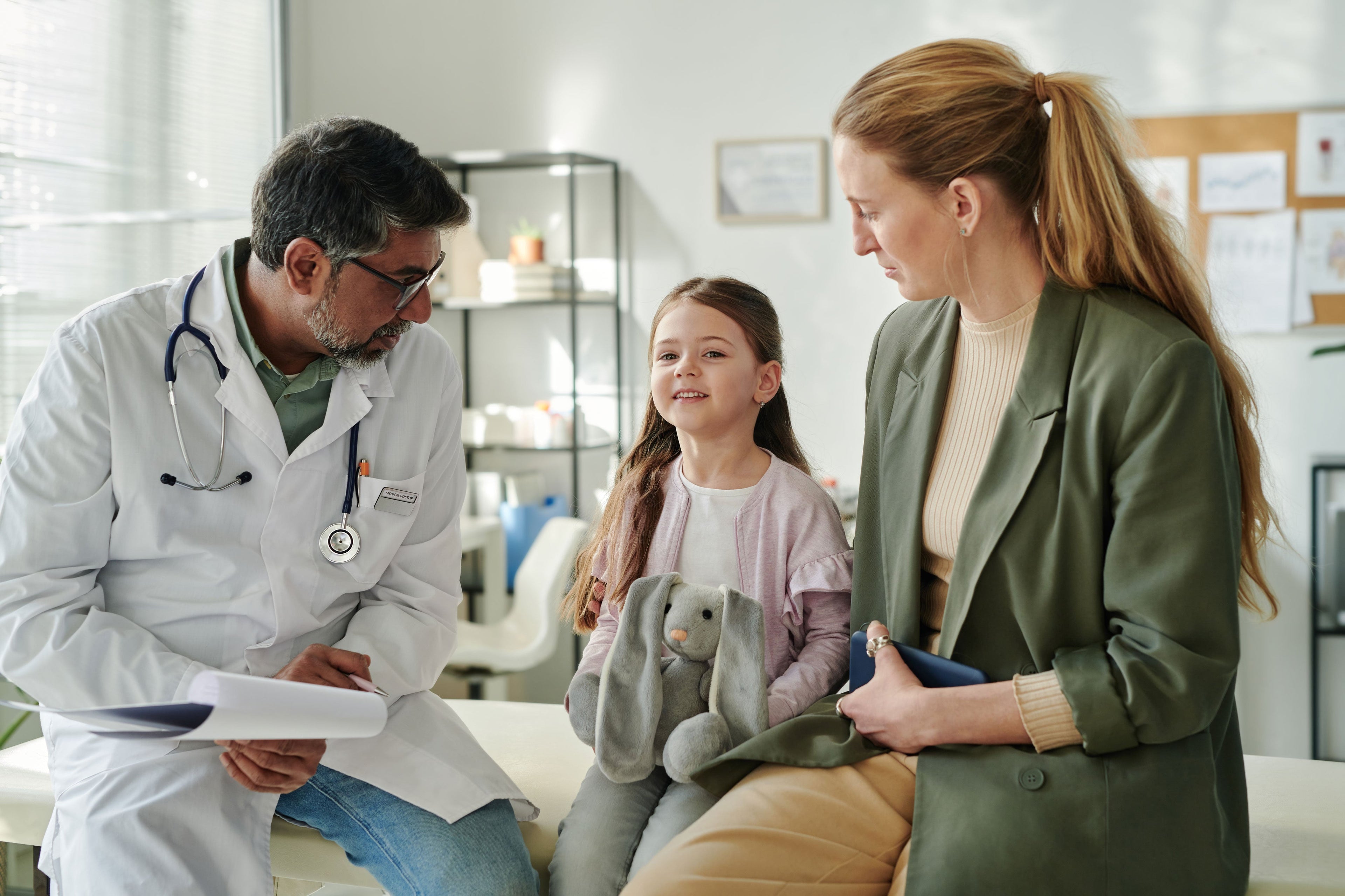 Parent talking with a pediatrician